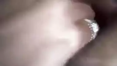 Young Indian chick perfectly combines listening to music with masturbation