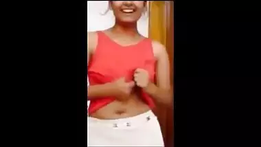 Desi quickly pulls up her T-shirt exposing XXX boobies upon sex request