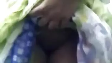 Desi chick in a colorful sari exposes tits and rubs XXX nipples