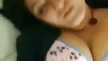 Young guy fucks his busty office colleague in a hotel room