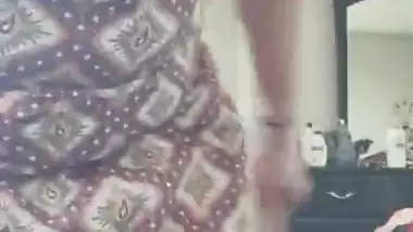 Indian aunty vacuuming