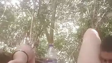 Mistress lets her servant lick her pussy during outdoor sex