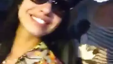 two hot babes flash there boobs and kiss each other in moving car..