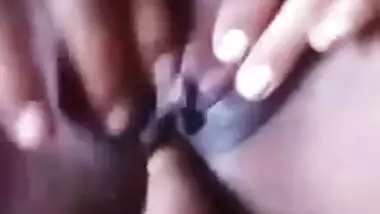 Amateur Desi babe rubs her XXX clitoris while cameraman is fingering ass