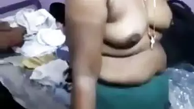 very shy indian aunty stripping infront of...