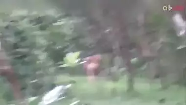 Two hot and sexy Desi aunty bathing in a outdoor under rain together