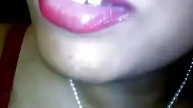 Sexy dark-skinned Indian girl shows up large breasts in the porn video