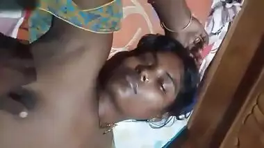 Village Desi XXX wife gets her boobs pressed by hubby while sleeping MMS