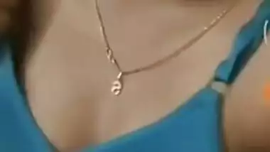 Girl with Indian features takes bra off exposing her boobs in sex show