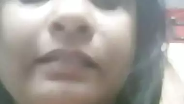 Desi bhabi self boobs press and licking boobs and her own finger selfie clip for lover