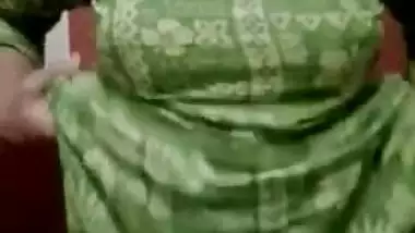 Green dress is thrown away and Desi sex model stay naked in XXX show