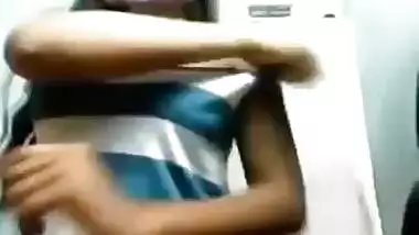 Young web camera cutie teases and pleases her fans with her large boobs